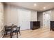Finished basement area featuring neutral walls, recessed lighting, and a small table set for casual use at 9694 Canberra Dr, Highlands Ranch, CO 80130