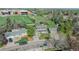 A high angle shot shows this home's yard, mature trees, and convenient location near a local school at 6621 S Cherry Way, Centennial, CO 80121