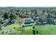 High-angle view of a home displaying mature trees, large backyard, and proximity to the neighborhood soccer field at 6621 S Cherry Way, Centennial, CO 80121
