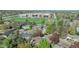 Elevated real estate image showcases the large sports field and the home's expansive backyard with shade structure at 6621 S Cherry Way, Centennial, CO 80121