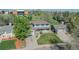 Aerial view showcases this property's lawn, and its proximity to the nearby school and park at 6621 S Cherry Way, Centennial, CO 80121