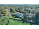 A high angle view of the home showing a full backyard, neighborhood, and mature tree coverage at 6621 S Cherry Way, Centennial, CO 80121