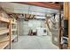 The basement features a washer, dryer, laundry sink and storage shelves at 6621 S Cherry Way, Centennial, CO 80121