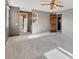 Large main bedroom with ensuite bathroom and plenty of natural light at 6621 S Cherry Way, Centennial, CO 80121