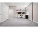 Spacious basement featuring modern office setup with desk, computer, and shelving, plus a separate entrance at 14833 E Crestridge Dr, Centennial, CO 80015