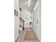 Welcoming entryway with stylish decor and staircase leading to upper level at 14833 E Crestridge Dr, Centennial, CO 80015