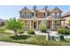 Charming two-story townhome with landscaped front yard and covered porch at 14833 E Crestridge Dr, Centennial, CO 80015