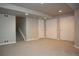 Spacious basement featuring neutral carpet, fresh paint, and convenient closet space at 13271 Holly St # B, Thornton, CO 80241