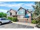 Attractive townhouse with mixed siding, manicured bushes and a convenient parking area at 13271 Holly St # B, Thornton, CO 80241