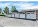 A row of private garages for each townhouse unit offer convenient parking at 13271 Holly St # B, Thornton, CO 80241