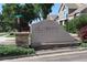 Old Farm Townhomes community entrance sign with stone accents at 13271 Holly St # B, Thornton, CO 80241