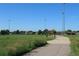 Expansive green sports field offers a play area with a walking path and shelter at 13271 Holly St # B, Thornton, CO 80241