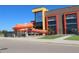 Modern community center with a bright orange waterslide for outdoor recreation at 13271 Holly St # B, Thornton, CO 80241