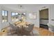 Dining room with scenic views and stylish lighting at 5265 Club Ct, Larkspur, CO 80118