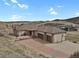 Beautiful single-story home featuring an attached three car garage and a gorgeous brick driveway and entryway at 5265 Club Ct, Larkspur, CO 80118