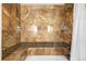 Tiled shower with shower head and seat at 9325 Meade St, Westminster, CO 80031