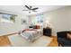 Cozy bedroom featuring a queen-sized bed, neutral decor, and ample natural light at 9325 Meade St, Westminster, CO 80031