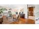 Comfortable living room with hardwood floors flowing into an open layout at 9325 Meade St, Westminster, CO 80031