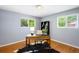 Bright office space featuring hardwood floors, a desk, and ample natural light at 9325 Meade St, Westminster, CO 80031