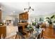 Open concept kitchen, dining room, and living room allows for easy entertainment at 9325 Meade St, Westminster, CO 80031