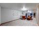 Finished basement with a comfortable sitting area at 1242 Elder St, Denver, CO 80221
