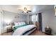 Spacious bedroom with a king-size bed and plenty of natural light at 1242 Elder St, Denver, CO 80221