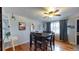 Dining area with hardwood floors and table for four at 1242 Elder St, Denver, CO 80221