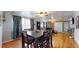 Dining area with hardwood floors and table for four at 1242 Elder St, Denver, CO 80221