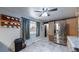 Kitchen with stainless steel refrigerator and wood cabinets at 1242 Elder St, Denver, CO 80221