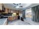 Kitchen with wood cabinets and granite countertops at 1242 Elder St, Denver, CO 80221