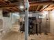 An unfinished basement with potential for customization and a well-lit office area at 3134 W Center Ave, Denver, CO 80219