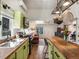 Charming kitchen with stainless steel appliances and open layout at 3134 W Center Ave, Denver, CO 80219