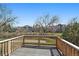 A relaxing deck with a view of the community and walking path at 6004 W Colorado Ln, Lakewood, CO 80232