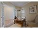 Bright home office with french doors and craftsman style touches at 6004 W Colorado Ln, Lakewood, CO 80232