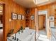 Relaxing bathroom with a soaking tub, wood paneling, and decorative accents for a peaceful retreat at 10400 W 35Th Pl, Wheat Ridge, CO 80033