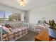 Cozy bedroom with natural light and a view at 10400 W 35Th Pl, Wheat Ridge, CO 80033