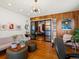 Office features hardwood floors, wood paneling, and an abundance of natural light at 10400 W 35Th Pl, Wheat Ridge, CO 80033