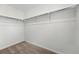 Walk-in closet offering ample storage space with installed shelving and carpet at 2079 Generations Aly, Brighton, CO 80601