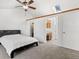 Spacious bedroom with a fan and carpet at 3819 S Waco St, Aurora, CO 80013