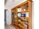 Built in wood bookcase with decor at 3819 S Waco St, Aurora, CO 80013