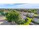 Aerial shot featuring townhomes nestled among lush green trees in a suburban neighborhood at 10819 Summerset Way, Parker, CO 80138