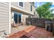 Cozy outdoor patio area with seating and a fenced yard at 10819 Summerset Way, Parker, CO 80138