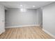 Open basement featuring modern flooring, recessed lighting and fresh paint at 3391 W 32Nd Ave, Denver, CO 80211