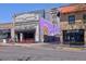 Street-level view of Mead St. Provisions with an impressive mural on the purple building at 3391 W 32Nd Ave, Denver, CO 80211