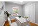 Office space featuring hardwood floors, natural light and a white desk at 3391 W 32Nd Ave, Denver, CO 80211