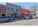 Exterior view of El Camino and Lucero storefronts with outdoor seating at 3391 W 32Nd Ave, Denver, CO 80211