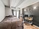 Bedroom with neutral walls and a desk at 100 S Clarkson St # 202, Denver, CO 80209