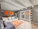 Cozy living room featuring access to a balcony, and modern decor at 100 S Clarkson St # 202, Denver, CO 80209