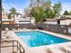 Community pool with lounge seating at 100 S Clarkson St # 202, Denver, CO 80209