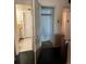 Hallway shot with access to bathroom and closet at 938 Racine St, Aurora, CO 80011